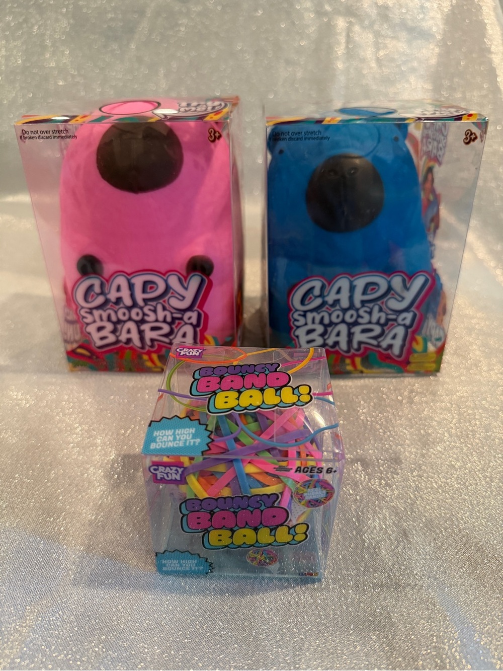 Capy Smoosh-a-Bara Squishy Toys In Pink and Blue (Set of 2) + Bouncy Band Ball